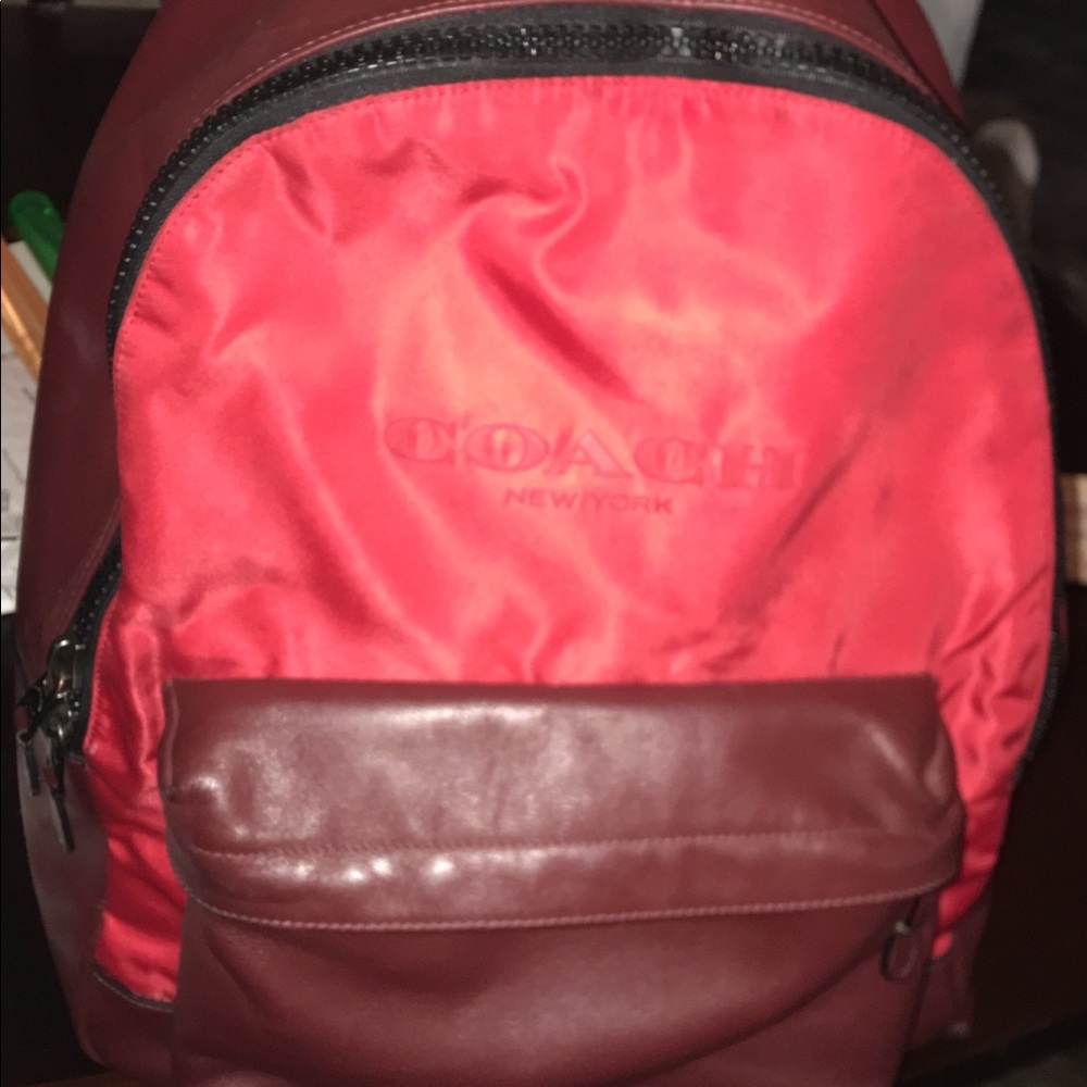 A red coach backpack.